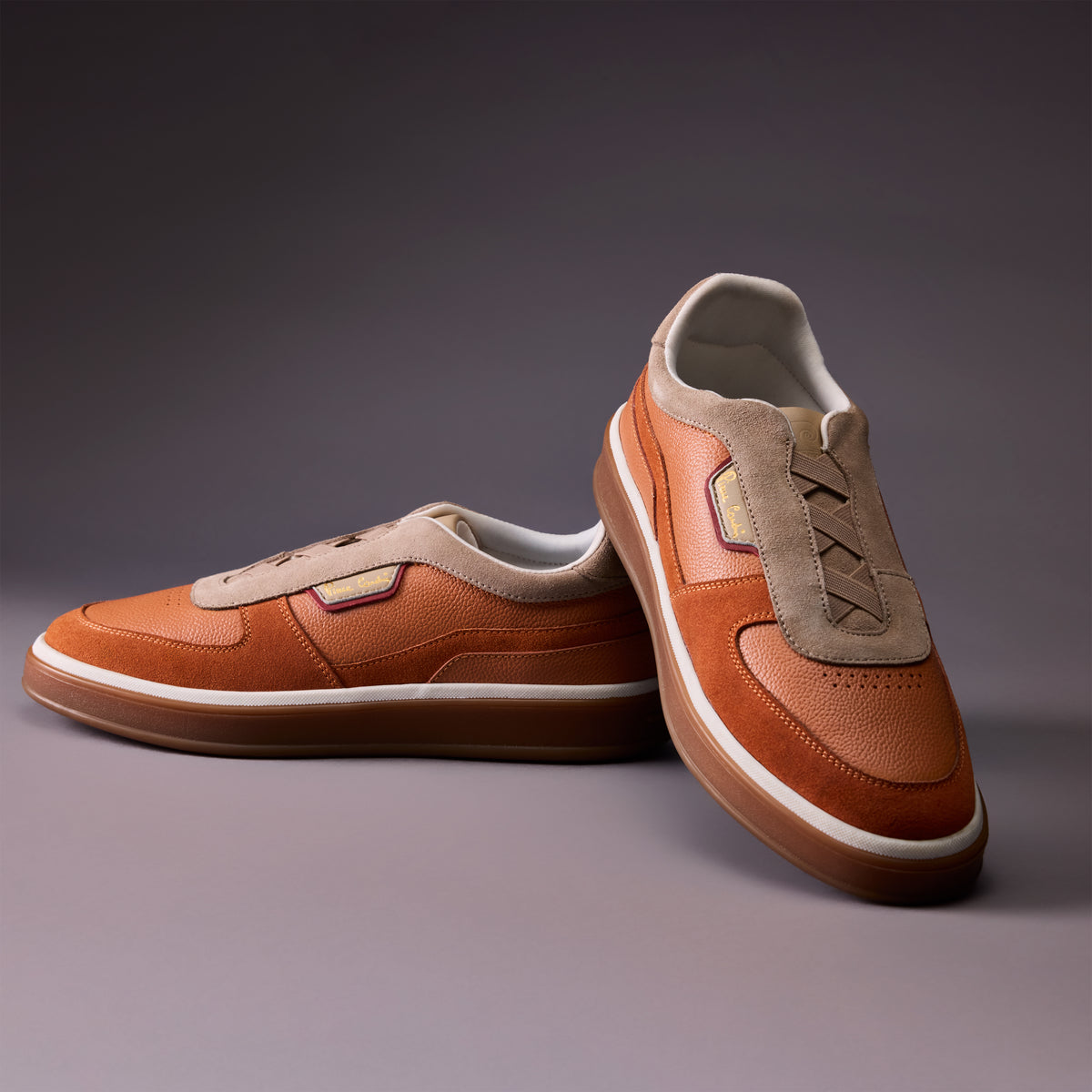 Helios Sunset Orange sneaker - lifestyle photograph